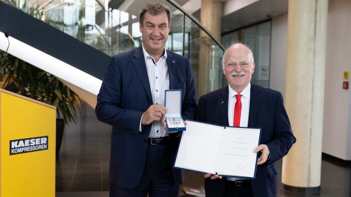 Thomas Kaeser receives the Bavarian Order of Merit from Markus Soder, Minister-President of Bavaria
